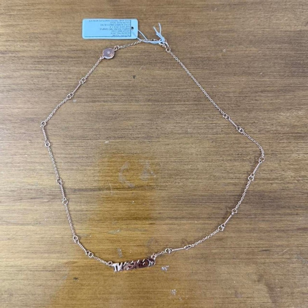 Silver chain necklace with a touch of pink